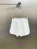 Mens shorts clássicos nicho insprima mens e feminino 22 Design da moda das mulheres novas com cruzamento de couro para slimm tem logotipo original