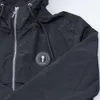 Trapstar American Solid Black Long Sleeved Liten Etikett huva Windbreaker Jacket Autumn Versatile