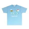 Rhude Brand Tshirt Mens Designer T Shirt Womens Design Kort ärm trendiga modekläder RH041 DREAM INSPIRATION Tryckt Kort ärm T-shirt Size S-XXL