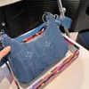 Fashion Classic Luxury French Brand Designer Bag New Women's Retro Style denim 2-i-1 dragkedja axelväska underarmväska kan hållas crossbody väska 2 remmar två färger