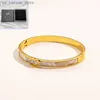 Charm Bracelets Classic Women Gold Plated Bangle Designer Jewelry Spring New Love Gift Bracelet Box Packaging Boutique Womens Stainless Steel Bangle240408