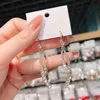 Charm koreansk nytt bandsimulerat pärla zirkon Tassel -studörhängen för kvinnor Långt spetshänge hängande droppsmycken gåva240408