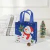 Geschenkverpackung 10pcs/Los Weihnachtskontrollbeutel wasserdichte nicht gewebte Stoff Schokoladenkosmetik Aufbewahrung Verpackung Jahr Party Kids Gefallen