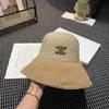 Designer Bucket Hat Women Wide Brim Straw Hats bucket hat designer Casquette Grass Braided Caps Vacation Beach Cap Men Beanie Summer