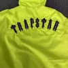 Le nouveau produit d'automne de Trapstar, une trench jaune à la mode de rue, une veste d'assaut à capuche à manches longues, décontractée et polyvalente