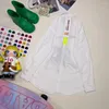女性用ブラウス手描きのキャラクター印刷されたポロカラー長袖のシャツ2024春のファッションブランドカジュアルホワイトブラウス女性