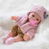 Realistische Babypuppe mit weichem Körper und Vinyl -Kopfarmen und Beinen, schöne weiche Babypuppe schöne Kleidung