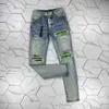 Jeans da uomo jeans slim jeans in angoscia in denim designer pantaloni in pelle con buchi lettere strappate al ginocchio strappato strappato per l'uomo dimensione della gamba dritta magra 29-38 lunga 2024cute