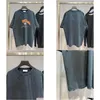 T-shirts masculins nouveaux tops d'été lâches t-shirts de mode décontractée Luxurys vêtements chemises de rue hommes femmes de haute qualité uni couple t s-xxl otsua