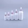 Equipos 10pcs 10ml 15ml 30ml 50ml 100ml Pearl White Glass Botella de aceite esencial Botella de empaquetado de suero Botella de embalaje con cuentagotas
