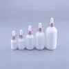 Urządzenia 10pcs 10 ml 15 ml 30 ml 50 ml 100 ml Pearl White Glass Olejki z olejku eterycznego butelki butelki kosmetyczne butelka z kroplowaniem