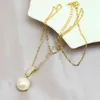 Colliers de pendentif 10 pièces Collier de perles de coquille blanche pealrs bijoux pendentifs mode 51914