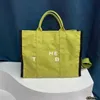 De Tote Bag Beach Bag Designer Tas Gym Bag Baby Tas Practical Grote capaciteit Schouder Handtas Vrouwen Munt Portebodem Crossual Square canvas