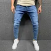 Menores al por mayor Denim Color sólido Jeans rasgados al aire libre Lápiz delgado Pantalones largos Palabos para hombres Pantalones informales