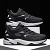 Mens Sports Running Shoe Designer Bounce Training Shoes Womens läder stickade mesh casual skor Elastiska basketskor Klassisk svart vit blå stor storlek 39-50