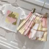 Nuove tute per bambini per la stampa colorata di stampa abiti da ragazza vestiti per bambini Designer taglia da 90-160 cm maglietta e gonna corta 24pril