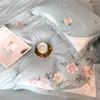 Set di biancheria da letto a fiori ricamati rosa set di lusso di cotone egiziano in cotone egiziano a doppia dimensione foglio piumino copripiumino 4 pezzi per casa