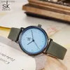 ساعات نسائية Shengke Simple Women Dress Es Retro Leather Clock Top Top Womens Fashion Mini Design Quartz Clock L46