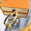 Bracelets de charme bracelets bracelets bracelet manchette de luxe marque de luxe femmes hommes bijoux de poignet 18 km plaqués à motifs en faux cuir lettre de chaîne de chaîne y24041668jx