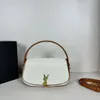 Mini Messenger sadelväskor av högsta kvalitet Kvinnor Mens Läder Cross Body Totes Travel Designer Väskor Luxury Flap Clutch Axel Handväskor Sling Satchel Bag