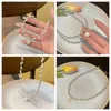 Naszyjniki wiszące projekt mody Exquipite perl kwiatowe naszyjniki dla kobiet eleganckie lekkie luksusowe łańcuch obojczyka naszyjnik francuskie biżuterię