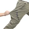 Pantalon pour hommes à quatre côtés de séchage rapide pour l'alpinisme