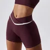 Pantalones cortos de yoga para gimnasio que se dirige a la mitad de la cintura para el entrenamiento de las mujeres al aire libre