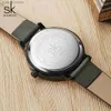 ساعات نسائية Shengke Simple Women Dress Es Retro Leather Clock Top Top Womens Fashion Mini Design Quartz Clock L46