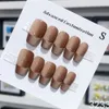 Presse coréenne faite à la main sur les clous y2k brun de bouteilles moyennes de la longueur de moyenne réutilisable adhésif faux couverture complète des ongles pour filles 240328