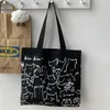 Kvinnor Retro Canvas Studenter Tygväska Casual Printing Cartoon Outdoor Sport axelväska Högkvalitativa Kopplingar