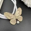 2024 modeontwerpster merk Pearl Butterfly broche haarspeld luxe sieraden accessorie trend 240401