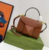 Bolsa de designer Bolsa Moda Rivet Mulheres Bolsa de luxo Bola de luxo Couro genuíno Bolsas de ombro simples da axil