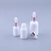 Urządzenia 10pcs 10 ml 15 ml 30 ml 50 ml 100 ml Pearl White Glass Olejki z olejku eterycznego butelki butelki kosmetyczne butelka z kroplowaniem