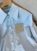 Blouses pour femmes Spring Elegant French Chic Blue Button Shirt Force For Office Lady Fashion avec un style à manches longues décontractées simples