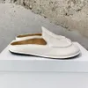 minimalismo i sandali a righe dita rotonde muli piatti scivoli scivolosi su scarpe in pelle pannelli di design di lusso per calzature di fabbrica femminile con scatola