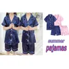 Pyjama d'été confortable sets pour garçons filles en soie satin topant à manches longues solides pyjamas soyeux pyjamas enfants de nuit