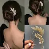 ブローチヘアリップラインストーンバレットフェザータッセルパールヘアピンヘアアーティファクト