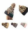 Leopard Animal Print Knit Faux Fur Pompom Zimowa czapka czapka dla kobiet ciepłe dzianiny faux fur pom hat ljJK249576661894