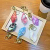 Keychains CONCH UNIQUE Décoration de porte-clés Portable Charme clé pour les voyageurs et les adultes