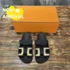 Designer tofflor Oran Sandals Leather Slides Summer Beach Classic Flat Fahion Men Women Shoes