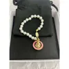 Ontwerper Viviane Westwood Sieraden Kleurrijke keizerin Dowager Enamel 3d Saturn Pearl ketting Dames Franse high -end planeet Kraagketen