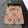 2024 Herrenbekleidung und Damenbekleidung Designer Shorts Summer Casual Street Wear Kurz trocknend Badebekleidung Plaid Striped Print Resort Strandhose Asiatische Größe M-3xl