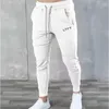 Calça masculina outono e inverno esportes casuais casuais no estilo coreano