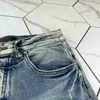 Jeans da uomo jeans slim jeans in angoscia in denim designer pantaloni in pelle con buchi lettere strappate al ginocchio strappato strappato per l'uomo dimensione della gamba dritta magra 29-38 lunga 2024cute