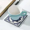 Matas de mesa Delft azul holandés: bosque de flores vintage y posavasos de cerámica con estampado de mariposa (cuadrado) Soportes de taza de té de flores