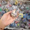 50pcsマカロン47mm*55mmプラスチックシャムカプセルおもちゃのボールさまざまなおもちゃのラムダムミックスと自動販売機面白い卵240329