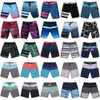 Mäns shorts nya spandex vtements de plage mens badstammar snabba torr shorts sommar surfkläder boardshorts gym kroppsbyggande shorts 30-38 T240408