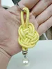 Keychains ylwhjj marque les fleurs tressées féminines de corde épaisse de la corde épaisses filles sac de perle pendante clés anneau accessoires de voiture jaune chaîne