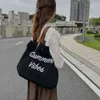 2024 New Korean Ins Embroidered Letter Tassel Canvas Bag with Large Capacity College Students One Shoulder Tote Bag for Women 240408