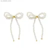 Charme Salicon Imitation Elegant Pearl Bow Stud Oreads Oreads Corée Charme d'oreilles Boucles d'oreilles Péris de mariage Bride Bijoux de bijoux 240408